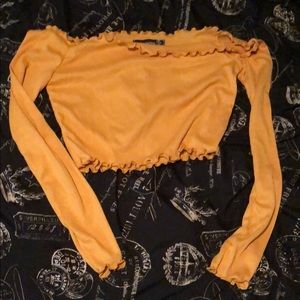 Off the shoulder long sleeved crop shirt